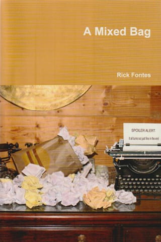 Typewriter and paper mess on table