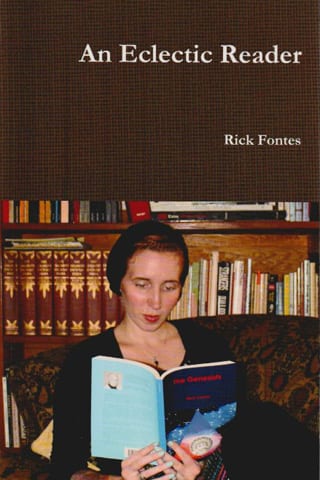 Woman reading book on a couch
